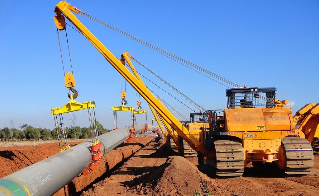 Burial of the 420-kilometre Santos GLNG underground gas transmission pipeline has commenced. Burial of the 420-kilometre Santos GLNG underground gas transmission pipeline has commenced.